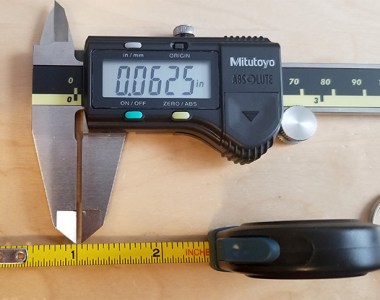 Anvil Tape Measure Markings with Calipers Check