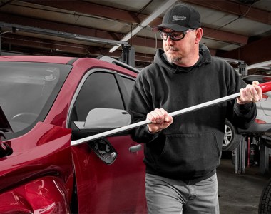Milwaukee Tool Pry Bars Longer Size in Use on Car